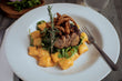 Tenderloin 8oz over Gnocchi with Alfredo and Meat Sweet Sauce